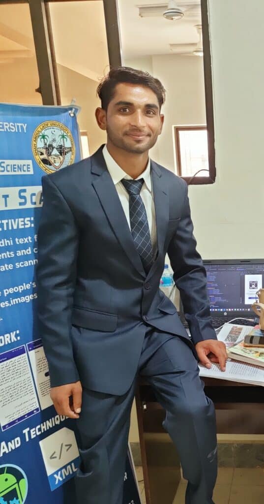 Founder of FabTechy(Farman Ali)Showing Projects on BAnner and on a Laptop